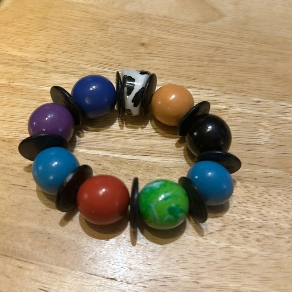 Bracelet wooden beads on stretch cord. Very cute and colorful.​​